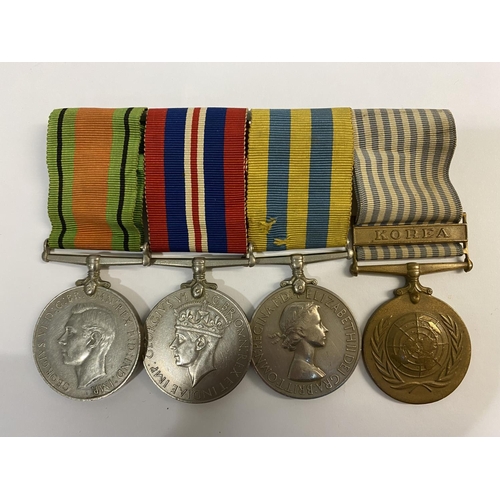 1080 - A SECOND WORLD WAR AND KOREA GROUP OF FOUR. A group of four comprising Defence and War Medal, Korea ... 