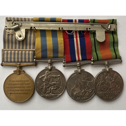 1080 - A SECOND WORLD WAR AND KOREA GROUP OF FOUR. A group of four comprising Defence and War Medal, Korea ... 