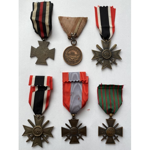 1081 - A COLLECTION OF SIX VARIOUS FIRST AND SECOND WORLD WAR MEDALS. A collection of six awards: A German ... 