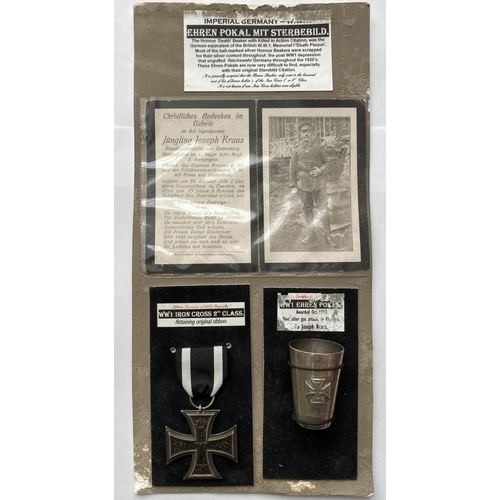 1082 - A FIRST WORLD WAR GERMAN IRON CROSS AND MEMORIAL CUP. An Iron Cross, 2nd Class dated 1914, and silve... 