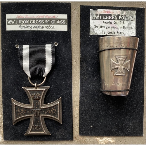 1082 - A FIRST WORLD WAR GERMAN IRON CROSS AND MEMORIAL CUP. An Iron Cross, 2nd Class dated 1914, and silve... 