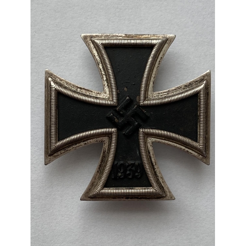 1083 - A GERMAN SECOND WORLD WAR IRON CROSS. An Iron Cross, 1st Class, dated 1939 to the front, stamped 361... 