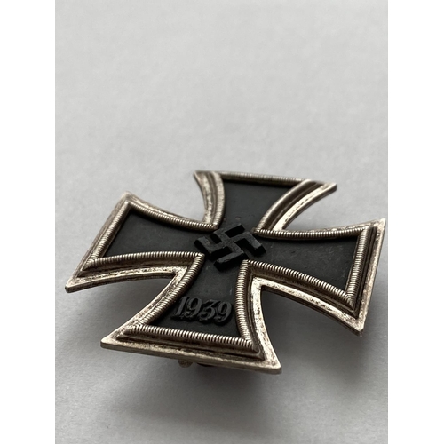 1083 - A GERMAN SECOND WORLD WAR IRON CROSS. An Iron Cross, 1st Class, dated 1939 to the front, stamped 361... 