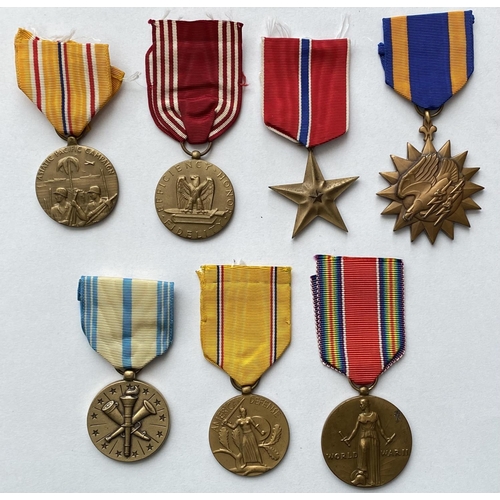 1085 - A COLLECTION OF SEVEN SECOND WORLD WAR AMERICAN MEDALS. A collection American Second World War award... 