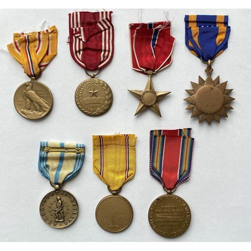 1085 - A COLLECTION OF SEVEN SECOND WORLD WAR AMERICAN MEDALS. A collection American Second World War award... 