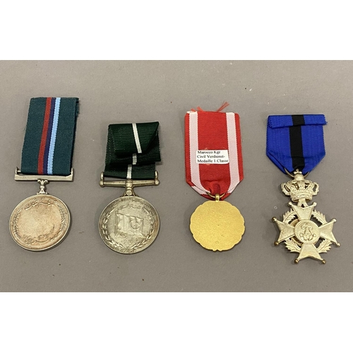 1086 - A COLLECTION OF FOUR SECOND WORLD WAR AND LATER AWARDS. A 1947 George VI Pakistan Independence Medal... 