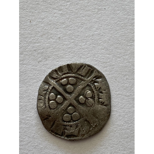 1131 - AN EDWARD I HAMMERED PENNY. An Edward I hammered silver penny , crowned facing portrait, long cross ... 