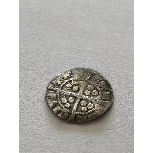 1131 - AN EDWARD I HAMMERED PENNY. An Edward I hammered silver penny , crowned facing portrait, long cross ... 