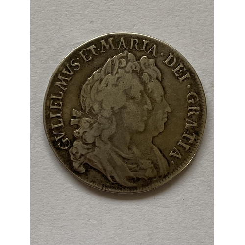 1132 - A WILLIAM AND MARY HALFCROWN. A William and Mary Halfcrown dated 1693, Anno Regni Quinto to the rim,... 