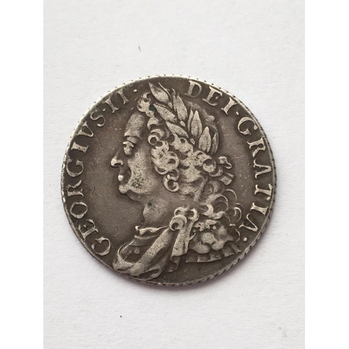 1135 - A GEORGE II SHILLING. Old laureate and draped bust l., reverse with plain angles, dates 1758.