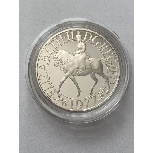 1145 - 1977 SILVER JUBILEE PROOF CROWN. A 1977 Silver proof Crown, Queen Elizabeth II Silver Jubilee, encap... 