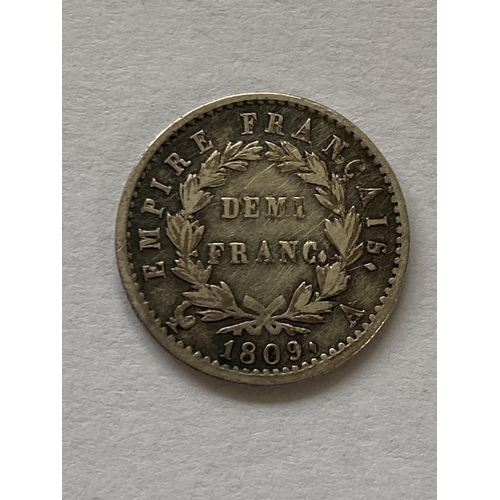 1147 - A FRENCH NAPOLEON BONAPARTE SILVER DEMI FRANC. A silver Demi Franc dated 1809.