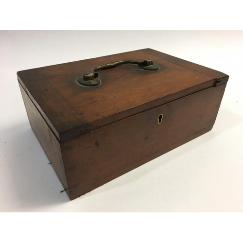 1157 - A VICTORIAN MAHOGANY COIN BOX AND A QUANTITY OF COINS. A mahogany box by T. Cooke and son with brass... 