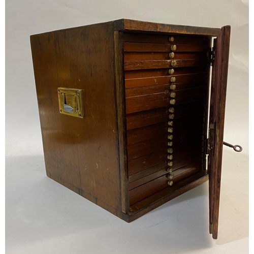 1189 - TWO COIN COLLECTORS CABINETS. A single door coin collectors cabinet with seven single depth drawers ... 