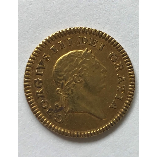 1292 - A GEORGE III THIRD GUINEA PIECE. A George III Third Guinea, second laureate head r, dated 1804. c2.9... 