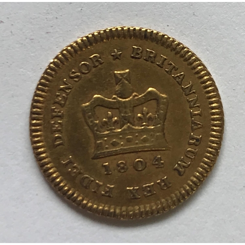 1292 - A GEORGE III THIRD GUINEA PIECE. A George III Third Guinea, second laureate head r, dated 1804. c2.9... 