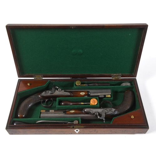 500 - A FINE PAIR OF CASED PISTOLS BY FISHER. The pistols with 20.5cm octagonal barrels engraved 'Fisher L... 