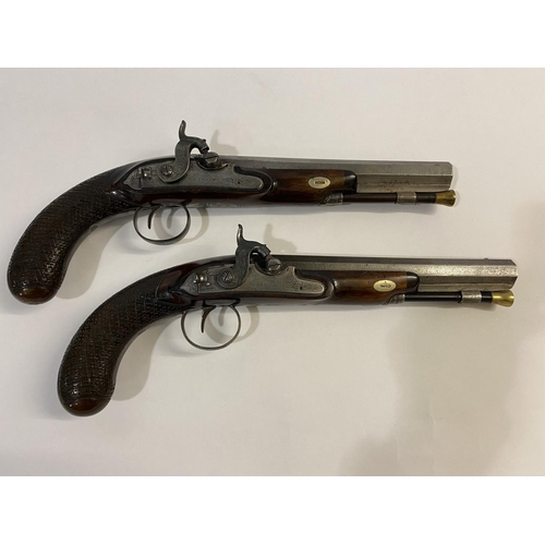 500 - A FINE PAIR OF CASED PISTOLS BY FISHER. The pistols with 20.5cm octagonal barrels engraved 'Fisher L... 