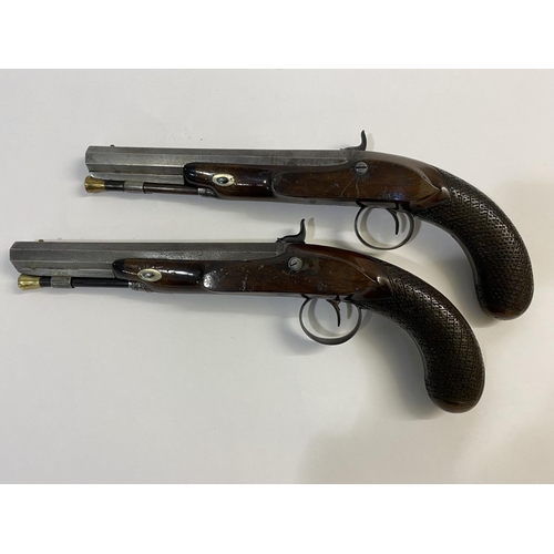 500 - A FINE PAIR OF CASED PISTOLS BY FISHER. The pistols with 20.5cm octagonal barrels engraved 'Fisher L... 