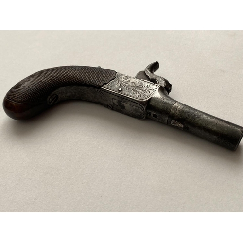 502 - A 19TH CENTURY WAISTCOAT PISTOL. A small percussion action pistol with a 3.5cm screw off barrel, the... 