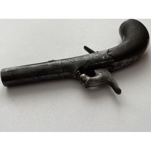 505 - A 19TH CENTURY WAISTCOAT PISTOL. A small percussion action pistol with a 4cm screw off barrel, the c... 