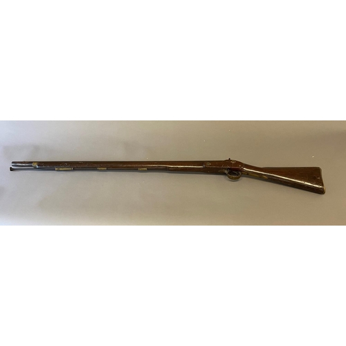 509 - A PERCUSSION MUSKET. With a 100cm barrel, with ram rod below, with percussion cap firing mechanism, ... 