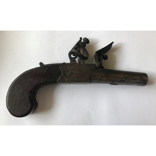 521 - A 19TH CENTURY FLINT LOCK POCKET PISTOL. With a 4.2cm screw off barrel with flintlock mechanism with... 