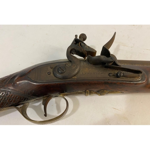 523 - A FLINTLOCK LONG GUN BY ANDERSON. With a 91cm tapering barrel with three proof marks and flintlock a... 