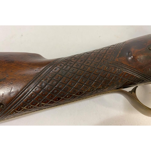 523 - A FLINTLOCK LONG GUN BY ANDERSON. With a 91cm tapering barrel with three proof marks and flintlock a... 