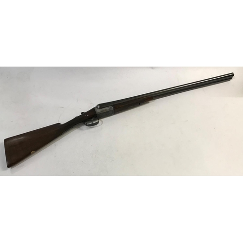 535 - A 12 BORE SHOTGUN BY MANTON AND CO. A 12 Bore Shotgun with 71cm side by side sleeved barrels marked ... 