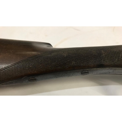 535 - A 12 BORE SHOTGUN BY MANTON AND CO. A 12 Bore Shotgun with 71cm side by side sleeved barrels marked ... 