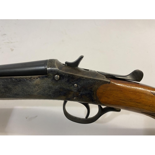 538 - A SPANISH 410 SINGEL BARREL SHOTGUN. With a 75cm barrel marked 'made in Spain' and with various proo... 