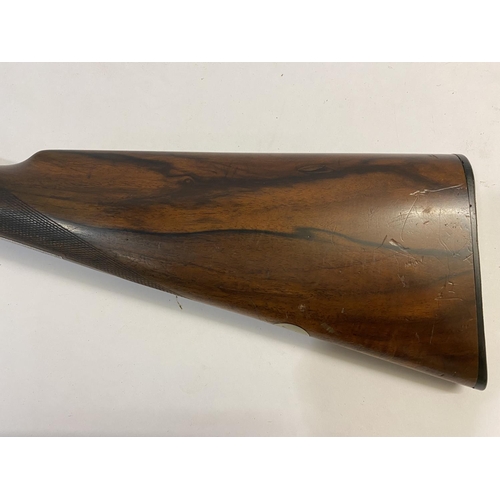 540 - A 12 BORE SHOTGUN BY TOLLEY OF LONDON. With 71cm side by side barrels, engraved to the top 'J & W To... 