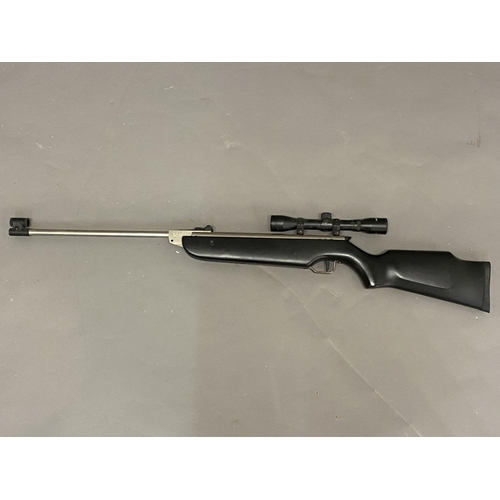 549 - A COMETA 300m AIR RIFLE & T/SIGHT. A .22 Cometa Air Rifle and Center-Point Telescopic Sight, in blac... 