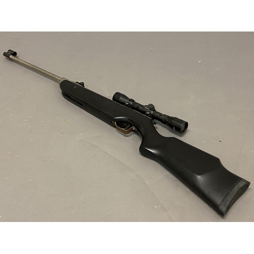 549 - A COMETA 300m AIR RIFLE & T/SIGHT. A .22 Cometa Air Rifle and Center-Point Telescopic Sight, in blac... 