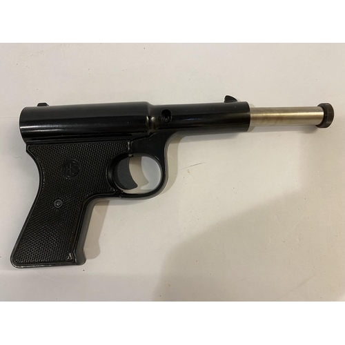 560 - AN HS MODEL 9 177 AIR PISTOL IN ORIGINAL BOX. With a compressing barrel, marked to the side 'Made in... 