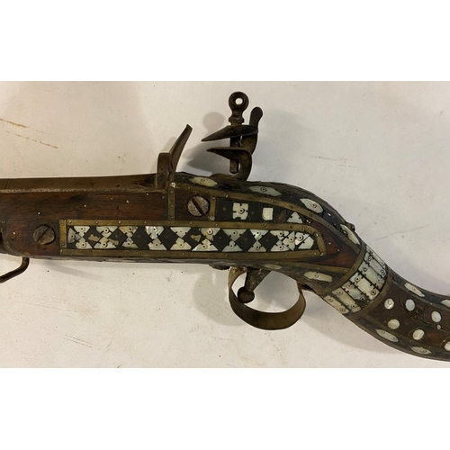 569 - A DECORATIVE 19TH CENTURY FLINTLOCK JEZAIL. A north African Jezail with a 66cm octagonal barrel with... 