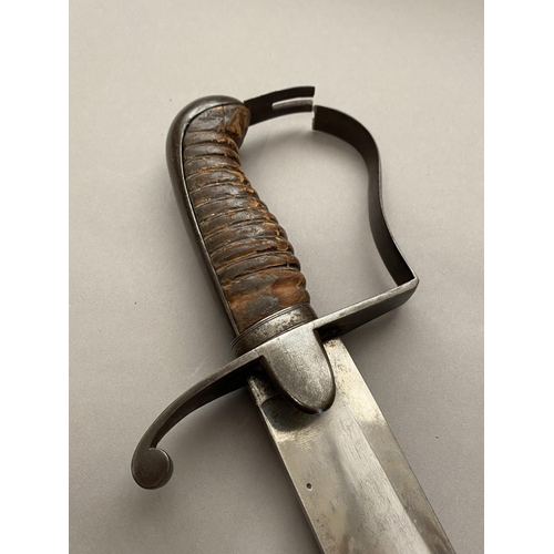 584 - A 1796 PATTERN CAVALRY TROOPERS SWORD AND SCABBARD. With an 83cm sabre type blade with sharpened edg... 