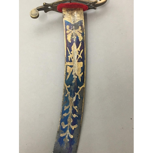 607 - AN IVORY HANDLED NAVAL DIRK. With a 36cm curved pointed blade with blued and gilt decoration of a ro... 