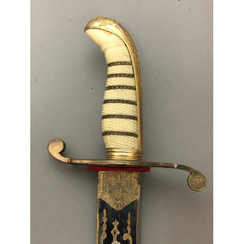 607 - AN IVORY HANDLED NAVAL DIRK. With a 36cm curved pointed blade with blued and gilt decoration of a ro... 