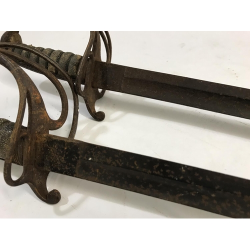 622 - TWO SIMILAR 1821/2 PATTERN CAVALRY OFFICER'S SWORDS. The first with an 88cm partially fullered point... 