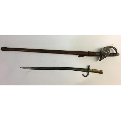 623 - A VICTORIAN 1895 INFANTRY OFFICERS SWORD  BY HENRY WILKINSON. With an 82cm pointed blade with etched... 