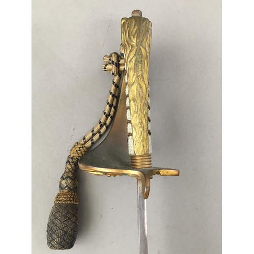 626 - A GEORGE VI NAVAL OFFICERS SWORD. With an 80cm pointed fullered blade with etched decoration includi... 