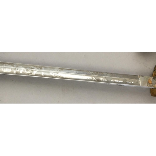 626 - A GEORGE VI NAVAL OFFICERS SWORD. With an 80cm pointed fullered blade with etched decoration includi... 