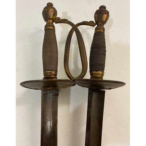 632 - A NEAR PAIR OF 19TH CENTURY DRESS SWORDS. A almost identical pair of swords, each with 82cm pointed ... 