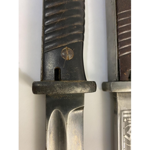 640 - TWO SECOND WORLD WAR S84/98 BAYONETS ONE WITH SS MARKINGS. A German S84/98 bayonet for use with the ... 