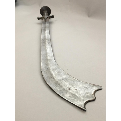 647 - A NEPALESE KORA. With a 59cm curved blade with broad wavy end, the steel handle with extended langet... 