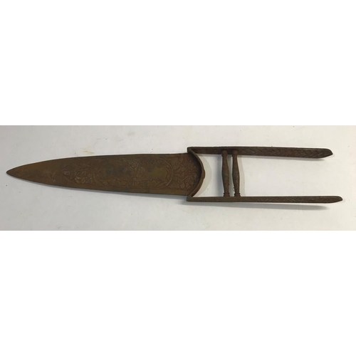 657 - A LARGE SINHALESE KATER OR PUSH DAGGER. With a large pointed blade engraved with animals amongst fol... 