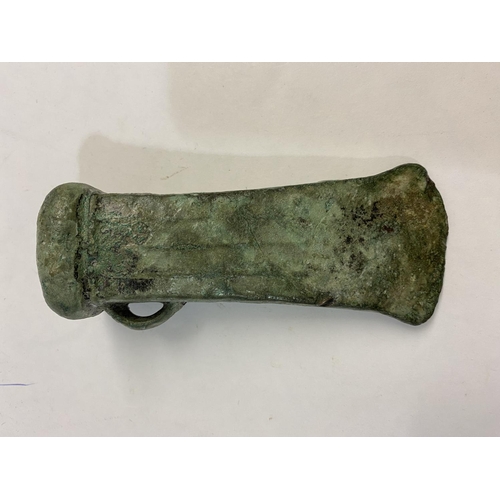 677 - A BRONZE AGE LOOPED AND SOCKETTED AXEHEAD. 1000 - 500 BC, a substantial looped and socketed axe head... 