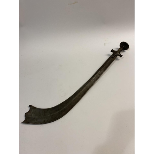 678 - A NEPALESE KORA. With a 59cm curved blade with broad wavy end, the steel handle with extended langet... 